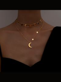 “Adeline’s Star and Moon: A Glimpse into the Elegance of Gold-Plated Stainless Steel Choker Necklace Set”
