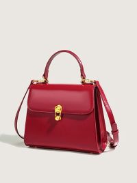 “Unveiling Mila: The Ultimate Vintage Satchel in Red, Black, and Caramel for the Modern Woman”