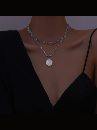 “Unveiling the Ayla: The Reign of the Multiple Layer Queen Head Necklace in Stainless Steel”
