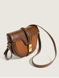 “Introducing Zayla: The Chic Caramel Saddle Bag Sling for Modern Women”
